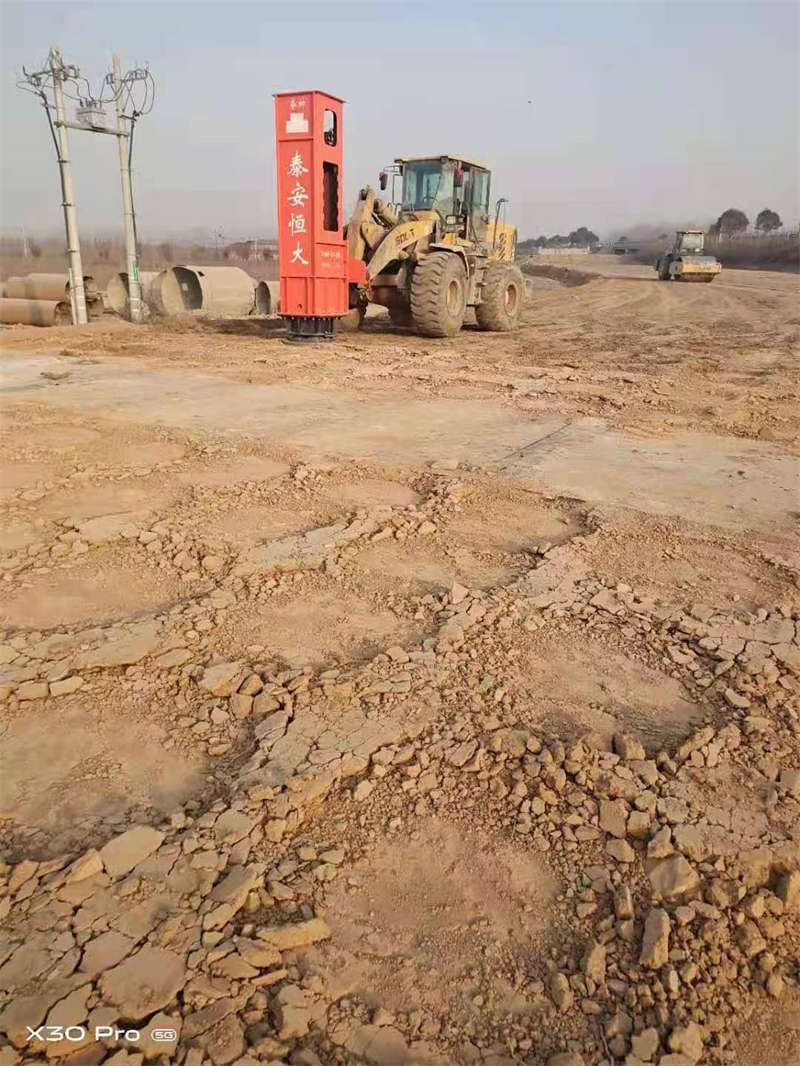 Rapid impact compaction is underway on road construction